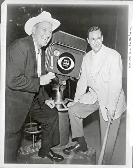 Dizzy Dean and Buddy Blattner Posing with Videocamera