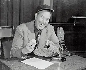 Sportscaster Prints: Dizzy Dean Holding Baseball in Press Box