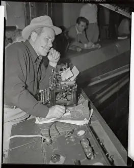 Sportscaster Prints: Dizzy Dean at a typewriter
