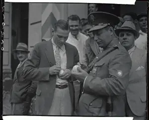 Autographing Prints: Dizzy Stops Traffic Down in Cuba