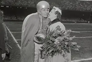 Doak Walker Being Kissed by His Wife