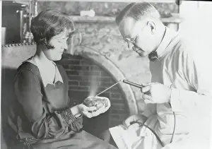 Doctor Demonstrating Use of Diathermic Needle