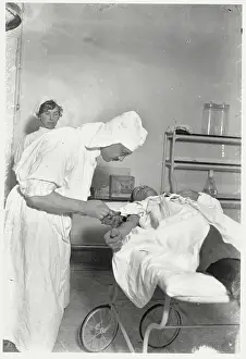 Doctor Drawing Blood from Patient