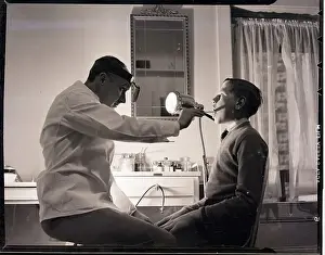 Tongue Prints: Doctor Examining Boy Patient