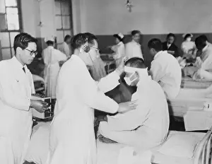 Doctor Examining Crew Member