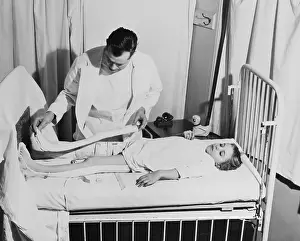 Doctor Examining Young Patient