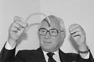 Fertility Prints: Doctor Patrick Steptoe Holding Fertilization Device