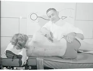 Doctor Writing on Woman's Back