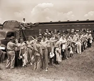 Doctors Inspecting Army Men at Base