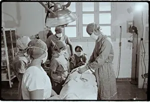 Doctors Operating in Vietnamese Hospital