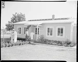 Doctors and Patients in Front of Migrant Clinic