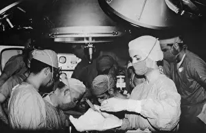 Stanford Prints: Doctors Performing Surgery