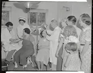 Visalia Prints: Doctors Treating Women at Migratory Camp