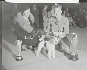 Dog Show Winner with Owners