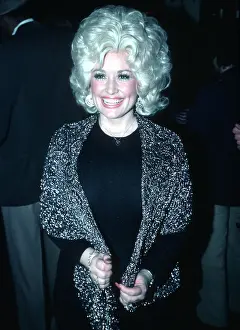 A Visual Tribute to Country's Reigning Queen: Dolly Parton At An Event