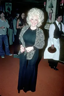 A Visual Tribute to Country's Reigning Queen: Dolly Parton At An Event