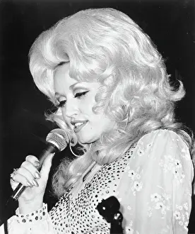 A Visual Tribute to Country's Reigning Queen: Dolly Parton Performing