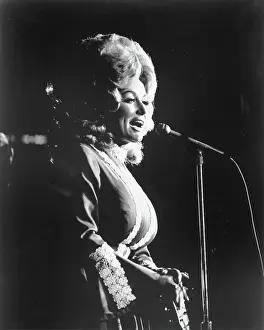 A Visual Tribute to Country's Reigning Queen: Dolly Parton Performing
