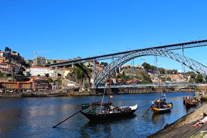 Dom Luis I bridge and rabelo boats in Porto