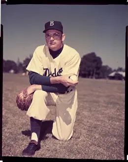 Don Bessent of Brooklyn Dodgers Stooping with Baseball and Mitt