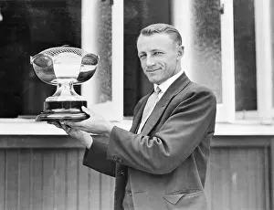 Don Bradman Holding Trophy