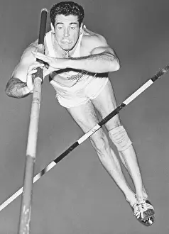 Don Bragg Going up and over at Pole Vault Competition