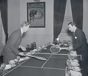 Don Budge and Fred Perry Playing Tennis on Dining Table