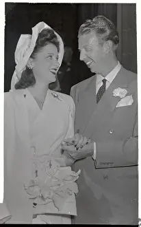 Don Budge Holding Hands with His Bride