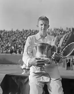 Don Budge Hugging Tennis Trophy