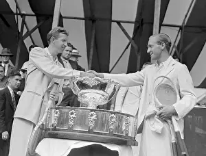 Don Budge and Jack Bromwich Shaking Hands over Davis Cup