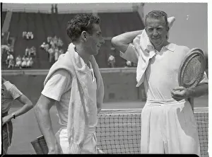 Don Budge and Robert Dively Toweling Off at Net