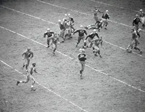 Catching Prints: Don Hutson Trying to Catch Football