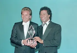 Don Johnson and Michael Thomas Holding Awards