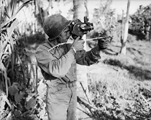 Don Senick Taking Newsreel Footage