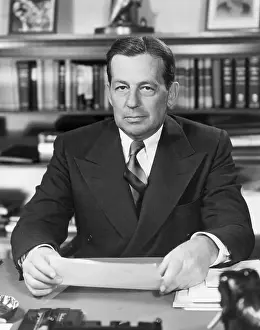 Douglas Prints: Donald Douglas Sitting At Desk W/Paper