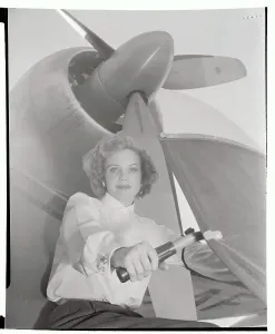 Burbank Prints: Doris Berger Posing by Plane Propeller