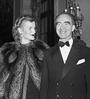 Candidate Prints: Doris Duke and Frank Murphy At Dinner; Standing, Smiling