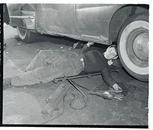 Doris Lang Working on a Car