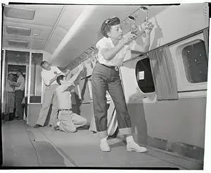 Dorothy Moreno Working on Interior of Plane