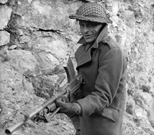 Doug Mason Posing with Rifle