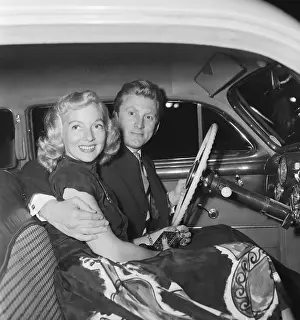 Douglas with Evelyn Keyes