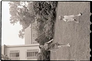 Mclean Prints: Douglas Kennedy Running on Lawn