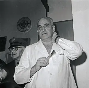 Dr. Adrian Kantrowitz Talking to Newsmen