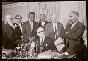 Floyd B Prints: Dr. Benjamin Spock Speaking to Newsmen