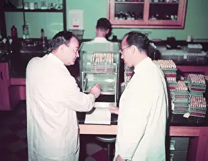 Assistant Prints: Dr. Byron L. Bennett and Dr. Jonas E. Salk in Laboratory