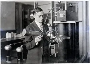 Tube Prints: Dr Coolidge Holds Cathode Ray Tube