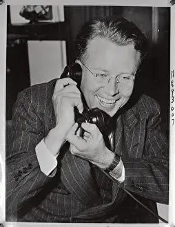 Ernest O Prints: Dr. Ernest O. Lawrence Speaking on Telephone