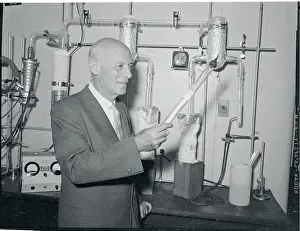 Cardiology Prints: Dr. Geza DeTakats Holding an Artery