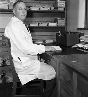 Award Prints: Dr. James B. Summer, Seated At Desk