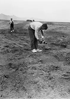 Alamogordo Prints: Dr. L. H. Hempleman Measuring Particles on Road